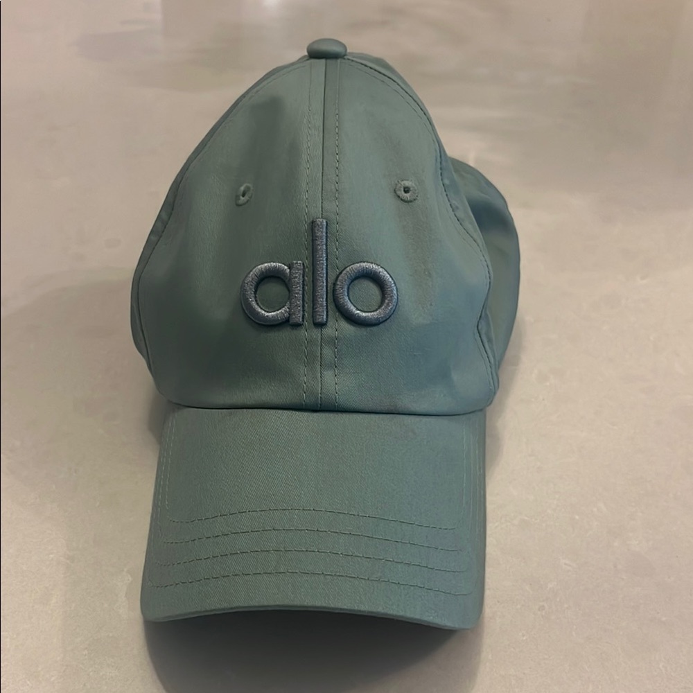 Alo teal performance off duty cap